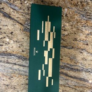 Rolex Green Box with Gold Design